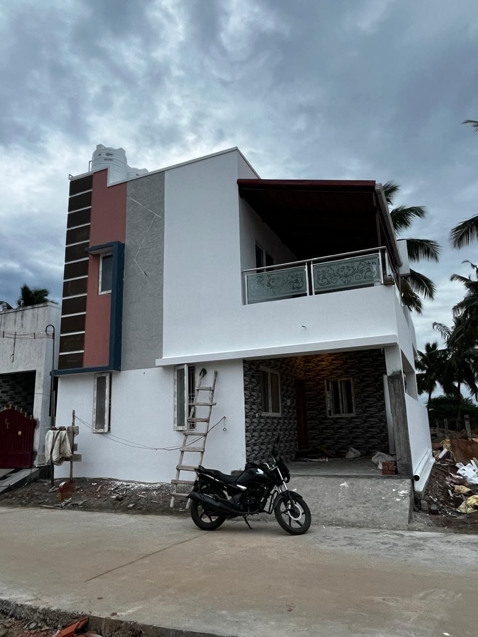 Two-floor home with glass balcony
